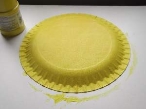 paper plate painted yellow